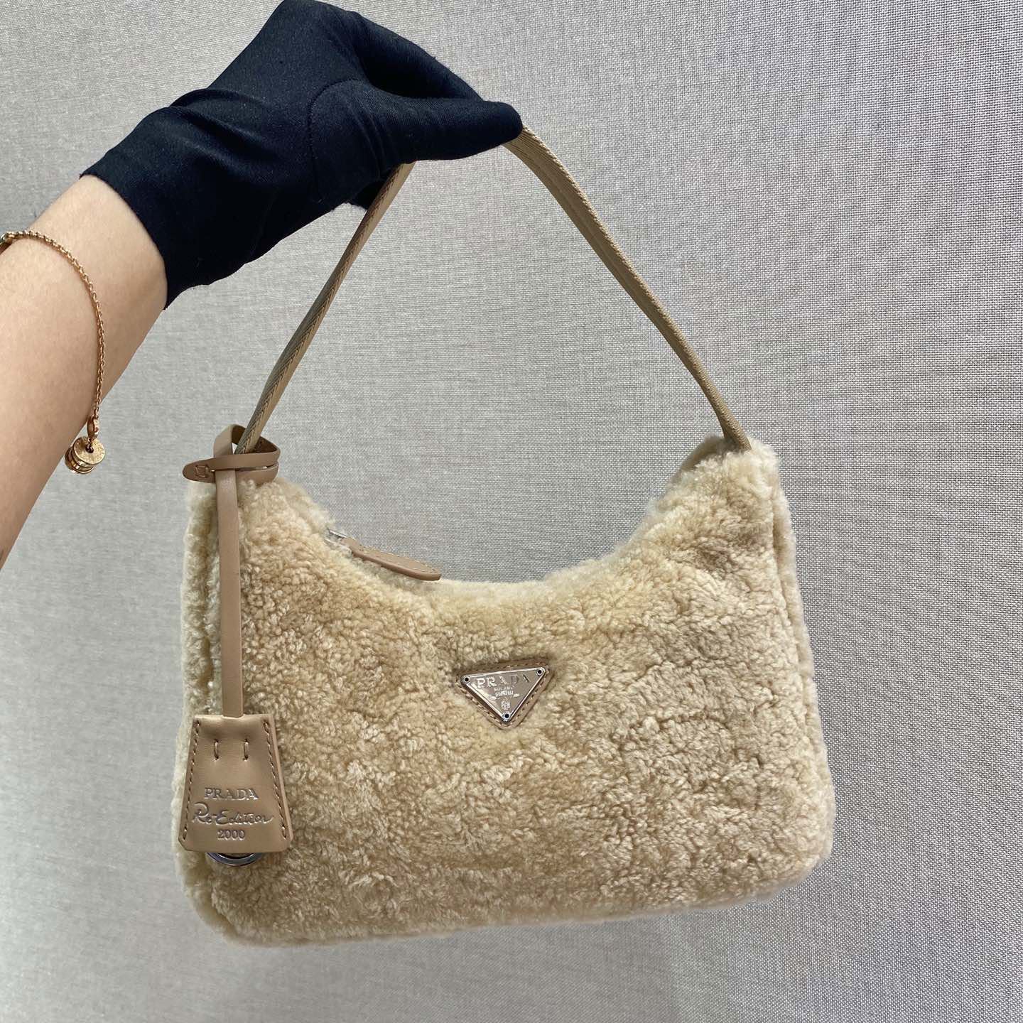 Pra*a top handle bags
